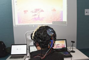 person interacting with a VR based student project at IDM showcase 2017