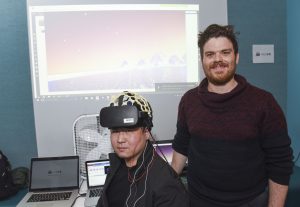 person interacting with a VR based student project at IDM showcase 2017