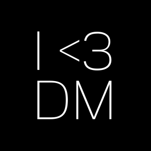IDM logo - black background with white text I heart D M