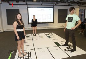 Student Project which is a large board game on the floor at IDM 2015 showcase