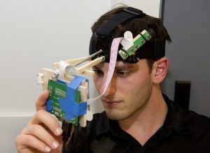 Student project with brain wave sensor and micro-controller at IDM 2015 showcase
